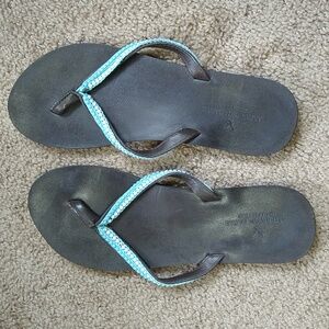 American Eagle flip flops.